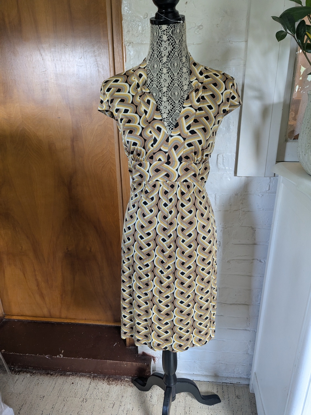 Trina Turk Geometric V-Neck Midi Dress in Beige and Black